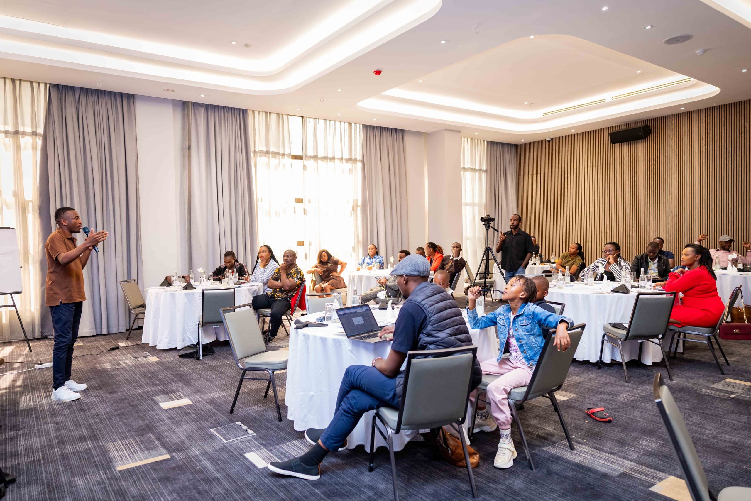 Participants working through an AI training exercise, photograph 5